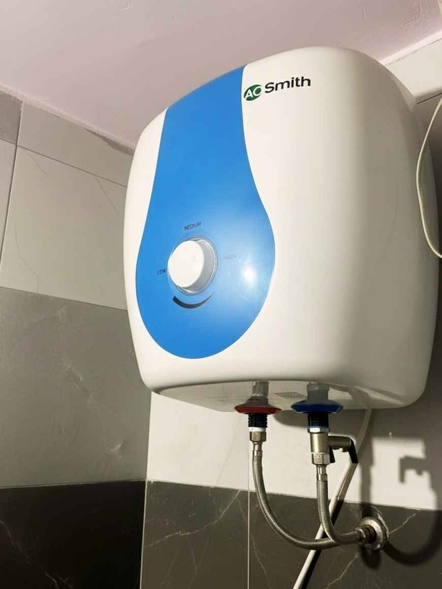 Close view of AO Smith SDS Green 15 Ltr water heater water temperature adjustment rotating knob