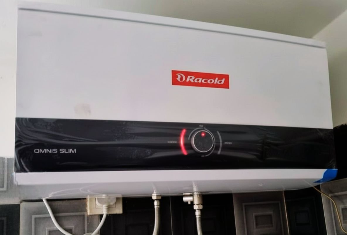 Close-up shot of the Racold Omnis Slim 15L installed in a bathroom