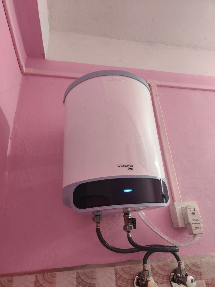 Close-up view of Havells Velora Pro 15L storage geyser showing water heating indicator light